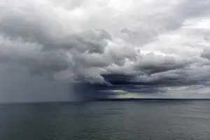 Atmospheric UK Landscapes Impressions: Dramatic rain clouds over the sea