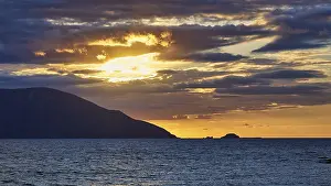 Aegean Sea Evening Sky Impressions: A dramatic sunset with clouds over the sea