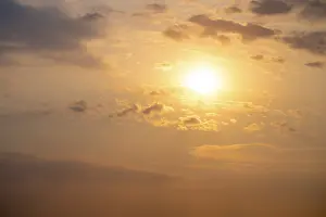 Cloudy Desert Landscape Impressions: Dramatic sunset with clouds and sun
