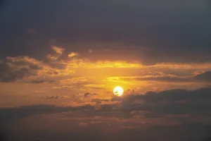 Namibia Sunset Impressions: Dramatic sunset with clouds and sun