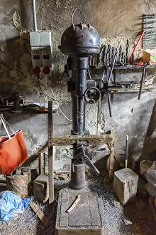 Handicraft Equipment Impressions: Drilling machine in an old workshop