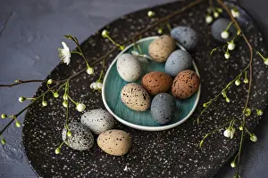 Spring Flowers Impressions: Easter table setting with colored eggs