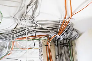 Electrical Power Supply Line Impressions: Electric cable on the ceiling of a flat