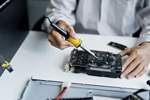 Computer Motherboard Impressions: IT Engineer installing Hardware Equipment Development Facility Engineer Maintenance computer Motherboard Electronic