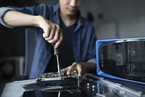 Computer Motherboard Impressions: IT Engineer installing Hardware Equipment Development Facility Engineer Maintenance computer Motherboard Electronic
