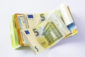 White Background Money Impressions: Euro, stack of banknotes, detail