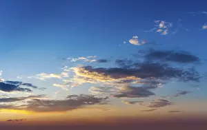 Dramatic Sunset Impressions: Evening sunset sky with dramatic clouds