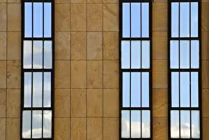 Office Building Facade Impressions: Facade divided into three with reflection in the windows