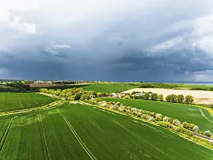 Agricultural Landscape From Above Impressions: Fields and Windmill from a drone