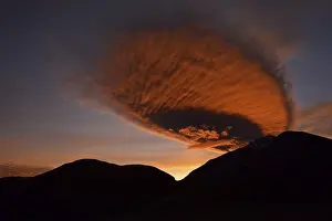Mountain Chain Scenery Impressions: Fiery red clouds above mountain range