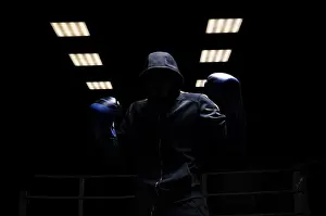 Boxing Concept Image Impressions: Fighter without a face is standing with his hands up