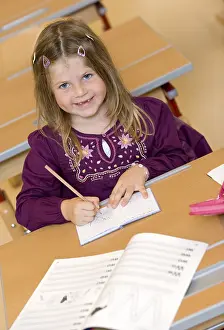 School Enrolment Process Impressions: Firstgrader during a lesson