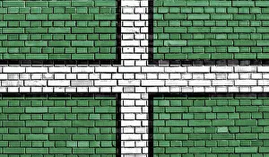 British Nationality Symbol Impressions: Flag of Devon painted on brick wall