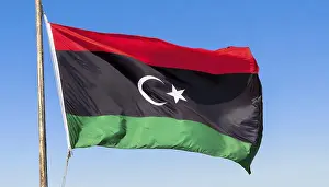 Libyan Flag Impressions: The flag of Libya, fluttering in the wind