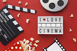 Red Background Concept Image Impressions: Flat lay cinema elements red background
