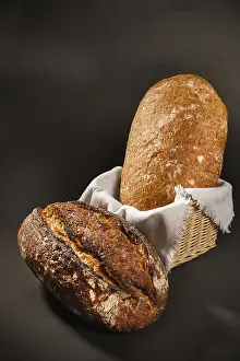 Homemade Baguette Impressions: Fresh bread on a dark background