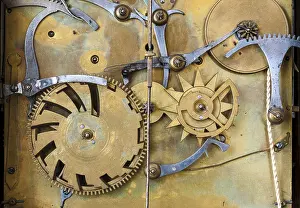 Clockwork Mechanism Impressions: Gears and cogs in the clockwork of a historical pendulum clock