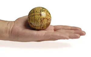Hand Holding Globe Impressions: Globe