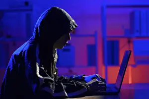 Hacker Attack Impressions: Hacker executing cyberattack leading to data breach