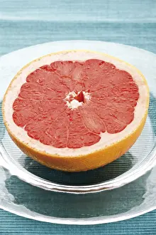 Close Up Citrus Fruit Impressions: Half of a red grapefruit, Ruby Star