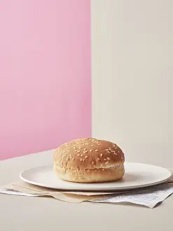 Deserted Table Setting Food Impressions: Hamburger bread alone with nothing in it