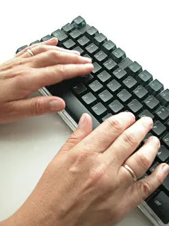 Electronic Communication Tools Impressions: Hands at computer keyboard