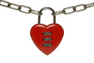 Symbolic Heart Shape Impressions: Heart lock with numeric code, symbolic image for finding a partner