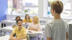 Education Concept Image Impressions: High angle boy presenting class