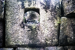 Historic Peruvian Architecture Impressions: Hole in the stone masonry of an inca building