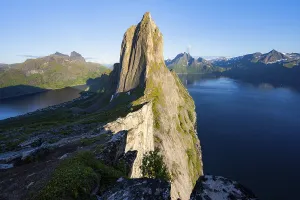 Steep Cliff Landscape Impressions: Iconic mountain Segla with steeply sloping cliffs