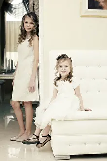 Sisterly Love Images Impressions: Image of elegant sisters posing looking at camera