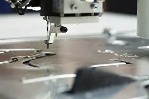Handicraft Industry Equipment Impressions: Image of thread and needle on sewing machine