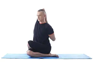 Athletic Male Impressions: Image of yoga instructor posing in studio