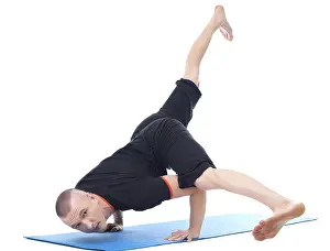 Gymnastics Training Photos Impressions: Image of yogi posing in studio looking at camera