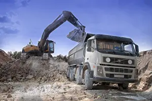 Empty Construction Grounds Impressions: Loading a large lorry building material