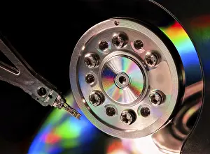 Electronic Data Storage Impressions: Macro of an open computer hard drive with the read write head