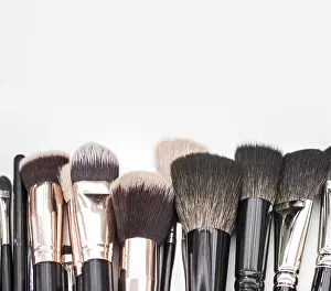 Beauty Product Display Impressions: Make up brushes plain background