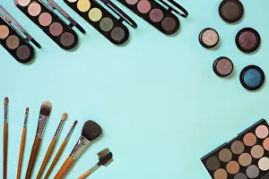 Blue Background Image Impressions: Make up essentials. Set of professional make up brushes