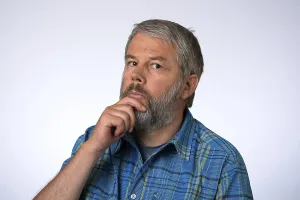 Pensive Man Impressions: Man, 55 years in studio, thinking, brooding