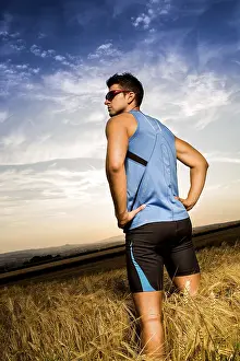 Recreational Activity Photo Impressions: Man jogging through the fields