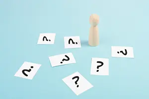Contemplative Male Figure Impressions: Man is thinking, question marks