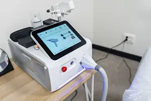 Cosmetic Procedures Impressions: Modern laser machine with a touchscreen interface showcasing its functions