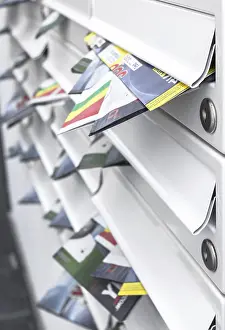 Shallow Depth Of Field Impressions: Modern mailboxes filled of leaflets