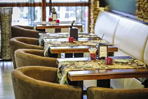 Modern Restaurant Interior Impressions: Modern restaurant interior with tables and sofas