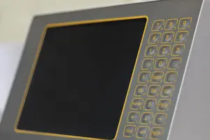 Handicraft Industry Tools Impressions: Monitor with touch-sensitive buttons on machine