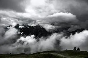 Atmospheric Landscape Shot Impressions: Mountain ridge with dramatic clouds