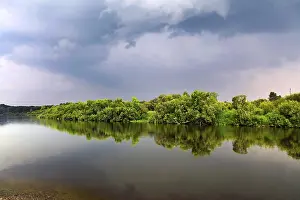 Overcast Sky Landscapes Impressions: Nature Landscape with Small River and Dramatic Clouds