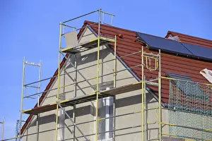 Residential Building Shell Impressions: New building with completed basic rendering of the exterior facade New building with completed basic rendering of