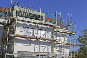 New Building Exterior Impressions: New building with completed basic rendering of the exterior facade New building with completed basic rendering of