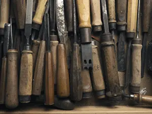 Handmade Goods Impressions: Old used chisel in a workbench drawer